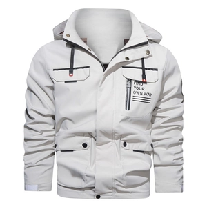 Detail of outdoor hooded jacket showing chest pockets and Find Your Own Way slogan print