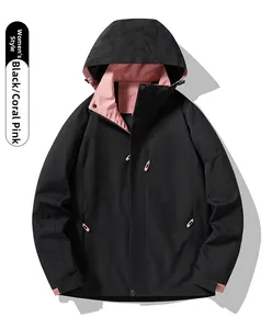 Women's outdoor jacket in Knight Black with Coral Pink lining and adjustable hood detail