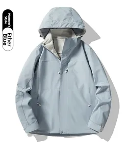 Detail of light blue waterproof outdoor jacket for women with hood and adjustable drawstrings