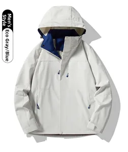 Detail of waterproof men's outdoor jacket in light gray with royal blue hood lining