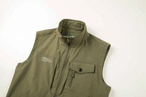 Detail of army green outdoor vest showing stand collar and breathable mesh lining