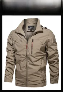 Detail view of khaki waterproof outdoor jacket featuring zip pockets and outdoor logo