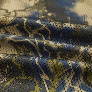 Macro view of breathable camouflage mesh fabric with lightweight polyester texture