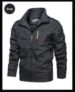 Detailed view of dark grey outdoor windbreaker jacket with full zipper and logo