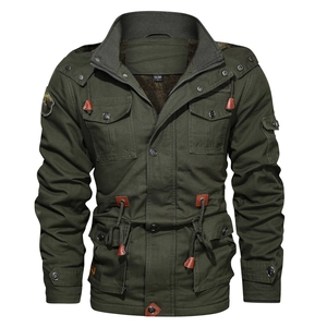 Detail of army green winter jacket featuring thick fleece lining and durable canvas texture