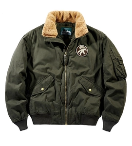 Detail of army green bomber jacket featuring sherpa collar and embroidered chest patch