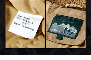 Detailed view of khaki work jacket with wool lining and 100% cotton fabric label