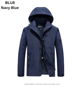 Detail view of navy blue hooded jacket with mesh lining and adjustable velcro cuffs