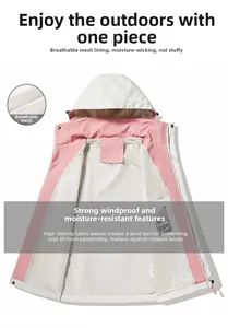 Detail of outdoor windbreaker showing pink mesh lining and adjustable drawstring hood