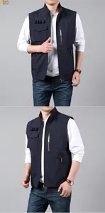 Detail view of dark blue outdoor vest featuring multiple utility pockets and zip design