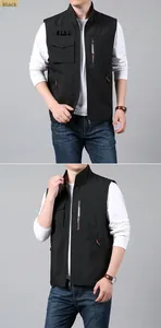Detail view of black outdoor tactical vest with multiple utility pockets and zip front