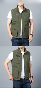 Detail view of military green outdoor utility vest featuring multi-pockets and stand collar