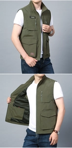 Close-up of military green outdoor vest featuring breathable mesh lining and multi-pockets
