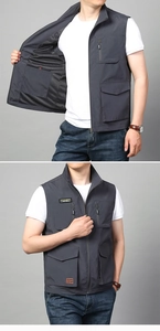 Detail view of men's outdoor vest featuring breathable mesh lining and inner zip pocket