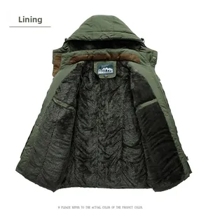 Detailed view of the thick gray fleece lining and brown corduroy trim on a green parka