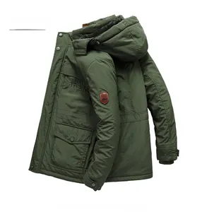 Detail view of military green winter parka with thick Sherpa lining and logo patch