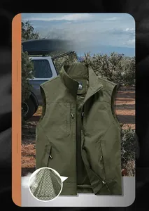 Detail view of breathable mesh lining in green multi-pocket outdoor fishing vest
