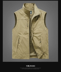 Detail view of khaki outdoor vest showing breathable mesh lining and zipper pockets