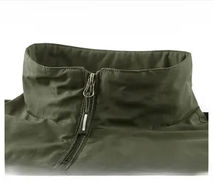 Detail view of military green outdoor vest featuring a stand-up collar and smooth zipper