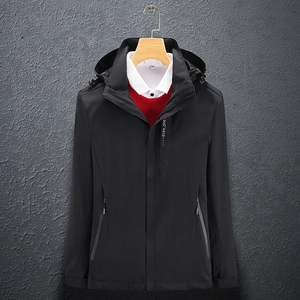 Detail of black waterproof outdoor jacket showing high neck zipper and Explore print