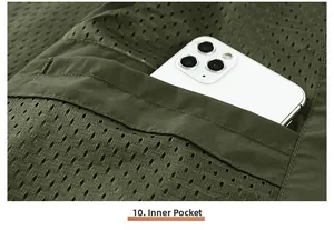 Detail shot of a mesh outdoor vest showing the functional inner pocket with a smartphone