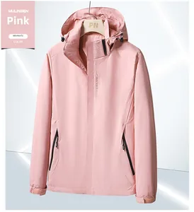 Detail view of pink waterproof outdoor jacket with EXPLORE print and hood
