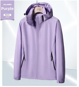 Detail view of purple waterproof jacket with adjustable velcro cuffs and zip pockets