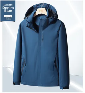 Detail of denim blue outdoor jacket with hood, zip closure, and EXPLORE logo print