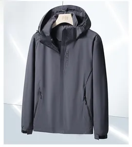 Detail of dark grey hooded windbreaker with EXPLORE print and concealed zipper