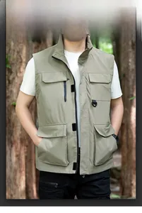 Detail of multi-pocket outdoor vest featuring functional flap pockets and D-ring attachment