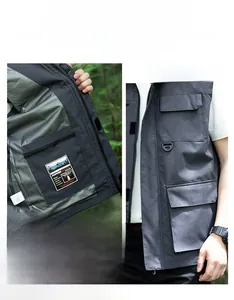 Detail of outdoor utility vest showing breathable mesh lining and secure interior pocket