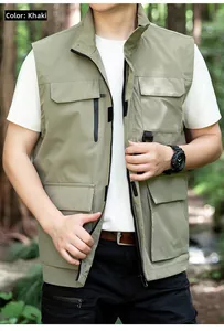 Detail view of khaki multi-pocket tactical vest with functional zippers and utility design