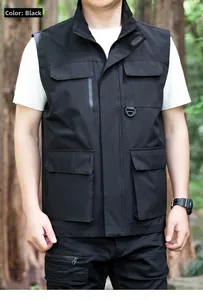 Detail of black tactical outdoor vest with multi-functional utility pockets and D-ring