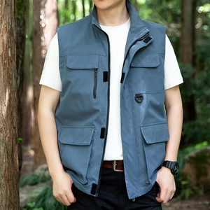 Outdoor utility vest for men in blue-grey with multiple pockets and stand collar