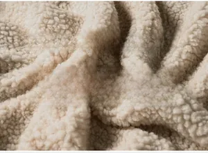 Macro shot of thick fleece lining in off-white for winter windproof warm jacket