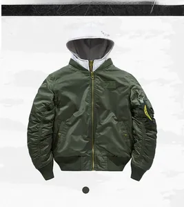 Detail of army green MA1 flight jacket featuring a gray hood and sleeve utility pocket