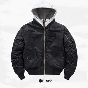 Detail of black bomber jacket featuring double zipper and grey removable cotton hood
