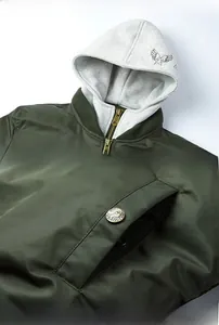 Detail view of MA1 bomber jacket with gray hoodie, metallic zipper and star print