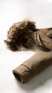 Detail of khaki winter jacket with fleece lining and windproof ribbed cuffs