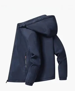 Detail of navy blue hooded jacket featuring sport pattern print and zip side pocket