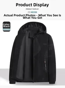 Detail of black windbreaker jacket showing SPORT and FASHION prints and hood drawstring