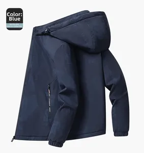 Detail showing deep blue jacket texture with sport letter print and zippered chest pocket