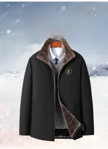 Detailed view of winter jacket with warm brown faux fur lining and embroidered chest patch