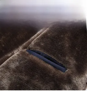 Close-up of winter coat inner hidden pocket with premium plush lining and neat stitching