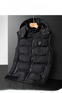 Detail of black hooded puffer vest showing windproof fabric and side zipper pockets