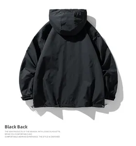 Back view of black hooded jacket with loose fit, adjustable cuffs and drawstring hem