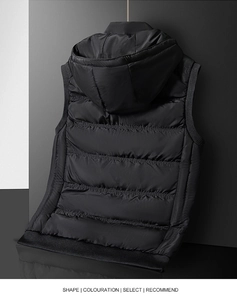 Detail view of the black hooded quilted puffer vest with elastic ribbed hem and windproof fabric