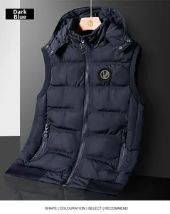 Detail view of navy blue hooded quilted vest with zipper pockets and ribbed hem