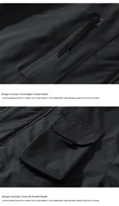 Detail view of the waterproof chest zipper and 3D cargo pockets on black outdoor jacket