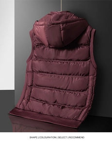 Detail view of the quilted design and ribbed hem on the purple hooded puffer vest